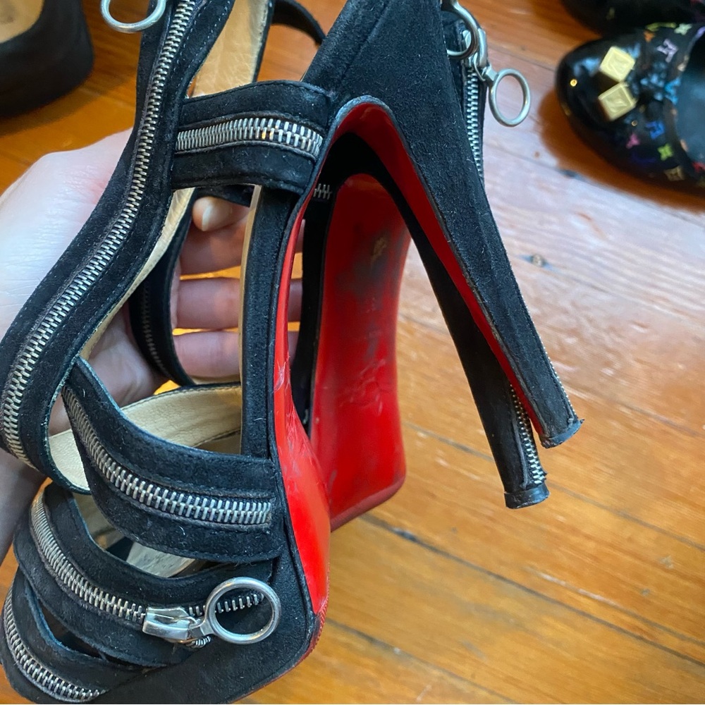 Retired show girl Louis Vuittons suede zipper heels